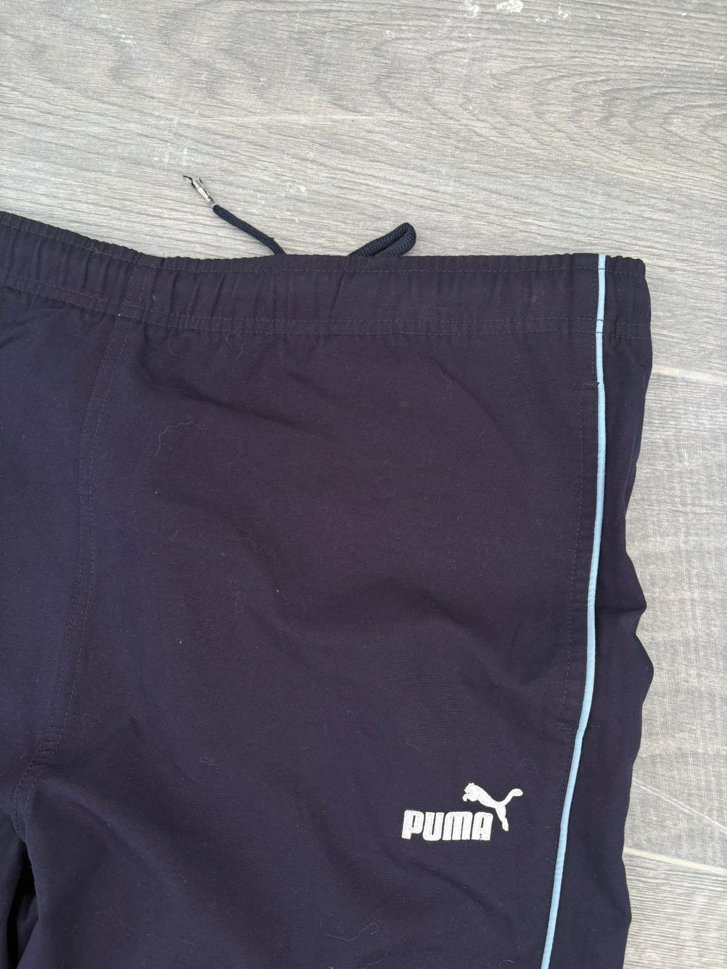 Navy puma and sky blue pants