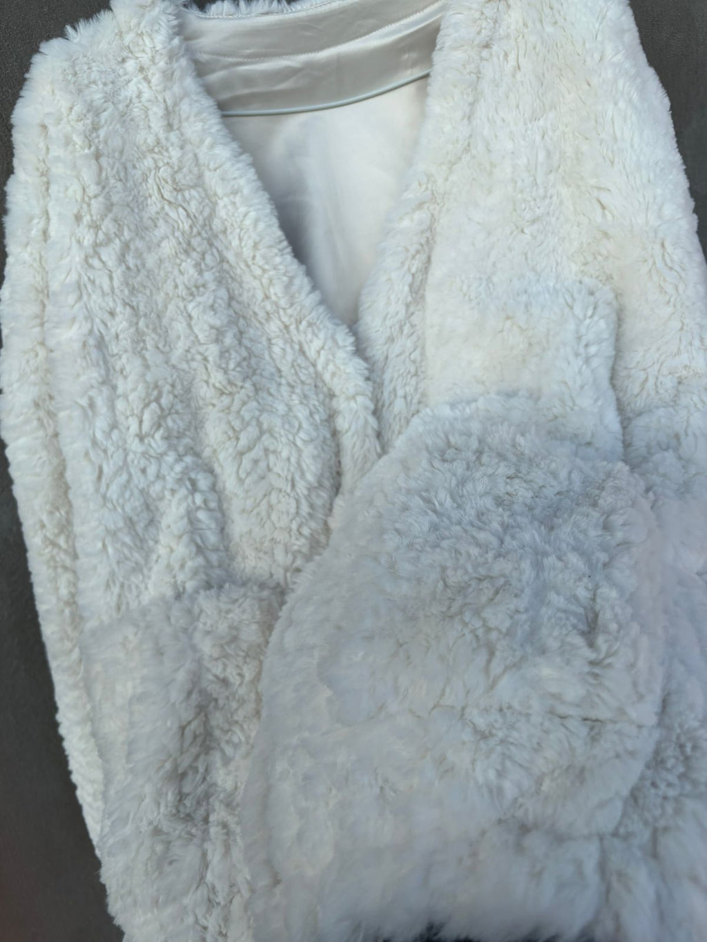 Heavy white faux-fur or "teddy" cropped jacket