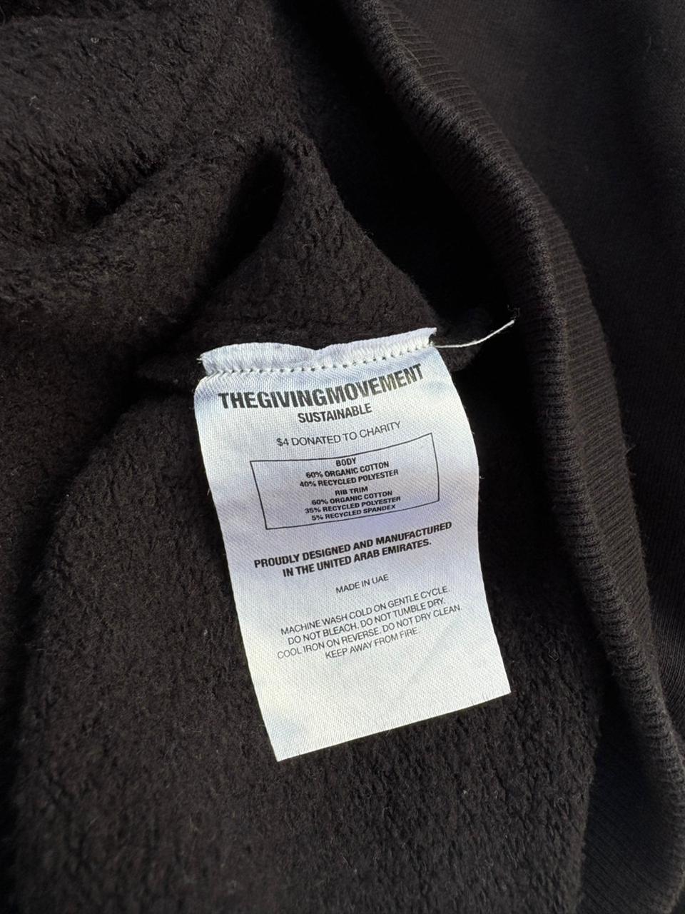 the giving movment black zip up jacket