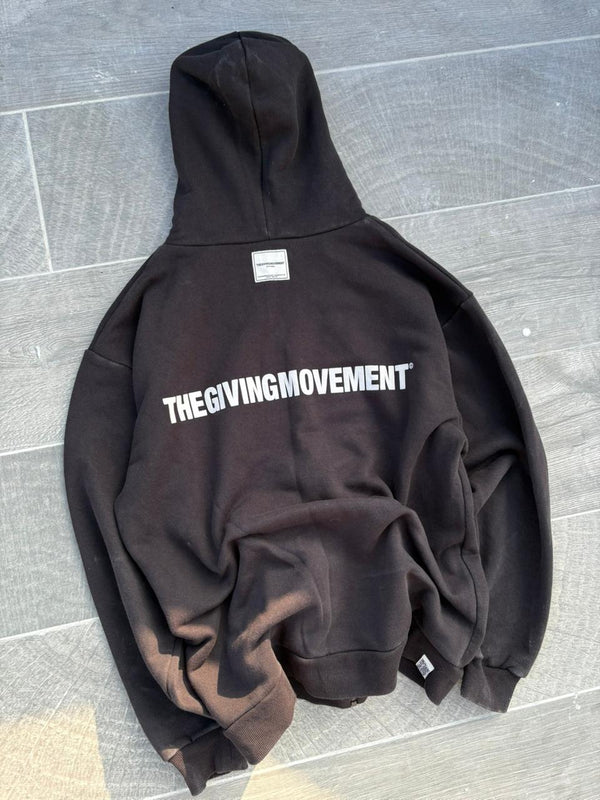 the giving movment black zip up jacket