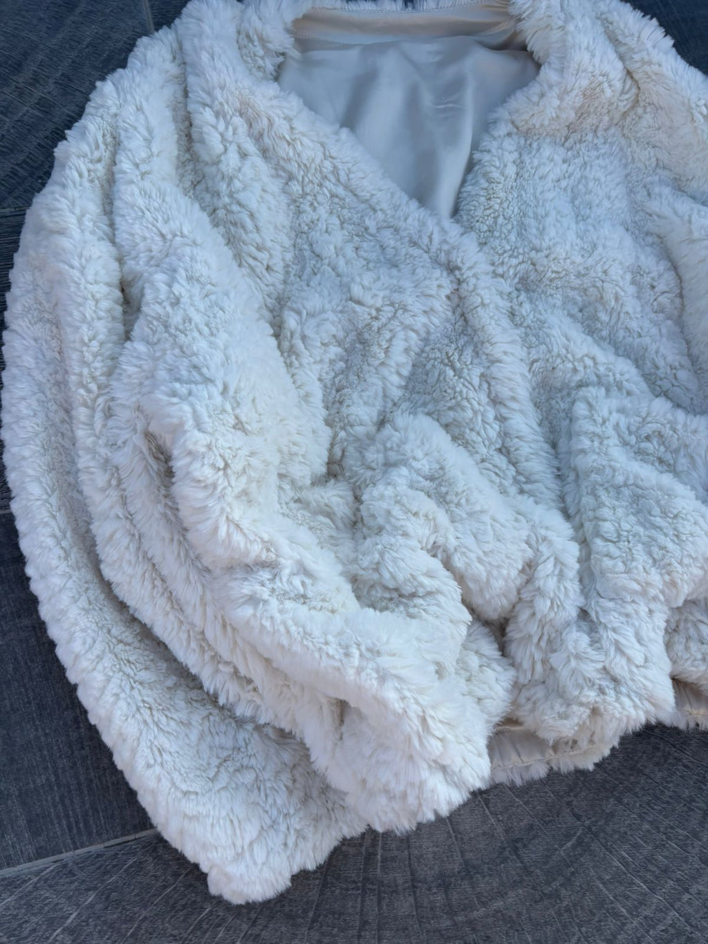 Heavy white faux-fur or "teddy" cropped jacket