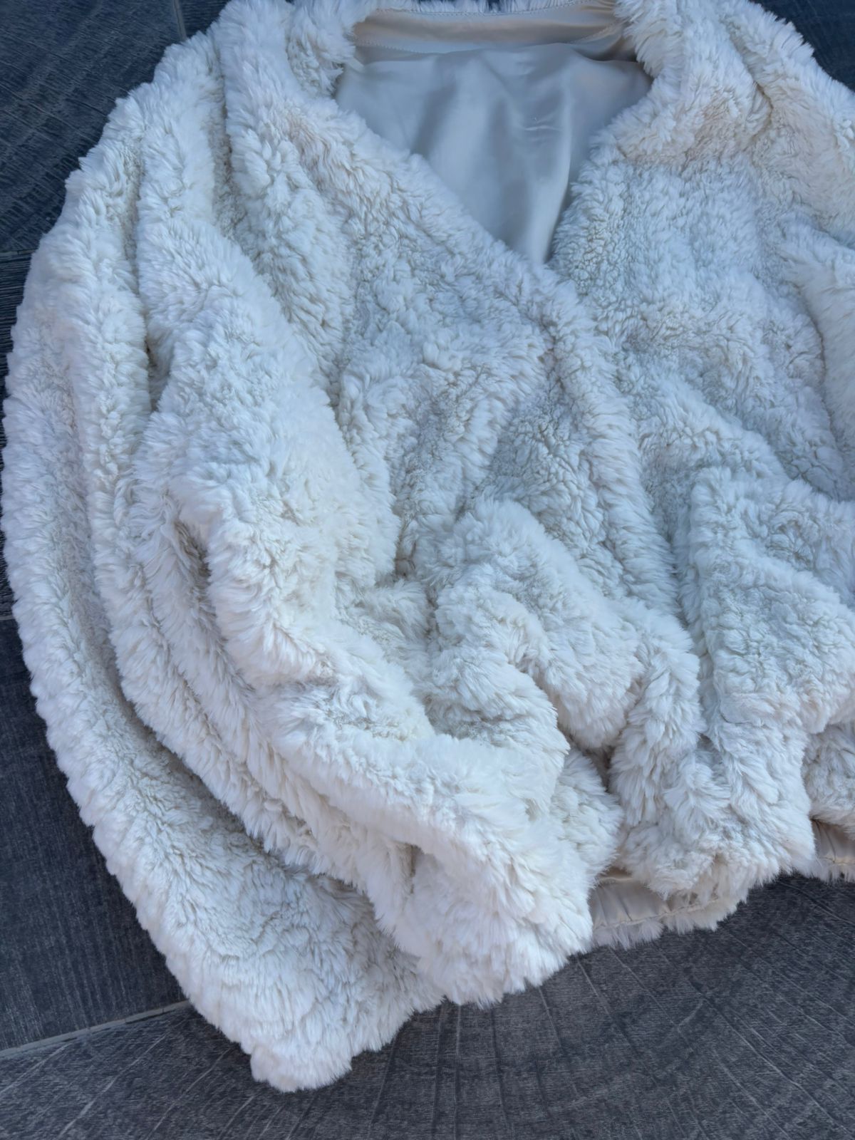 Heavy white faux-fur or "teddy" cropped jacket