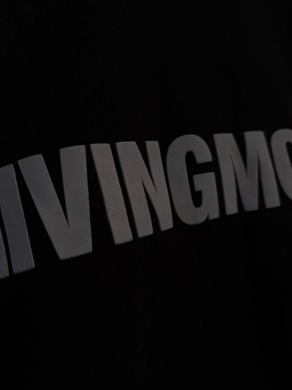 the giving movment black zip up jacket