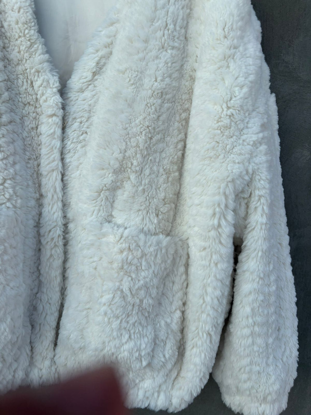 Heavy white faux-fur or "teddy" cropped jacket