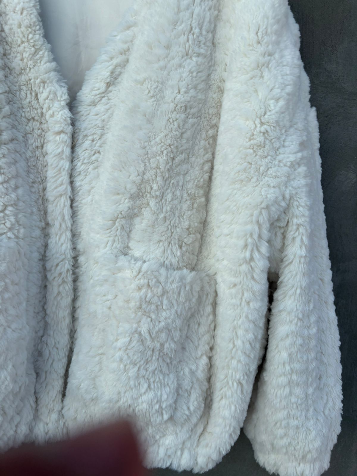 Heavy white faux-fur or "teddy" cropped jacket