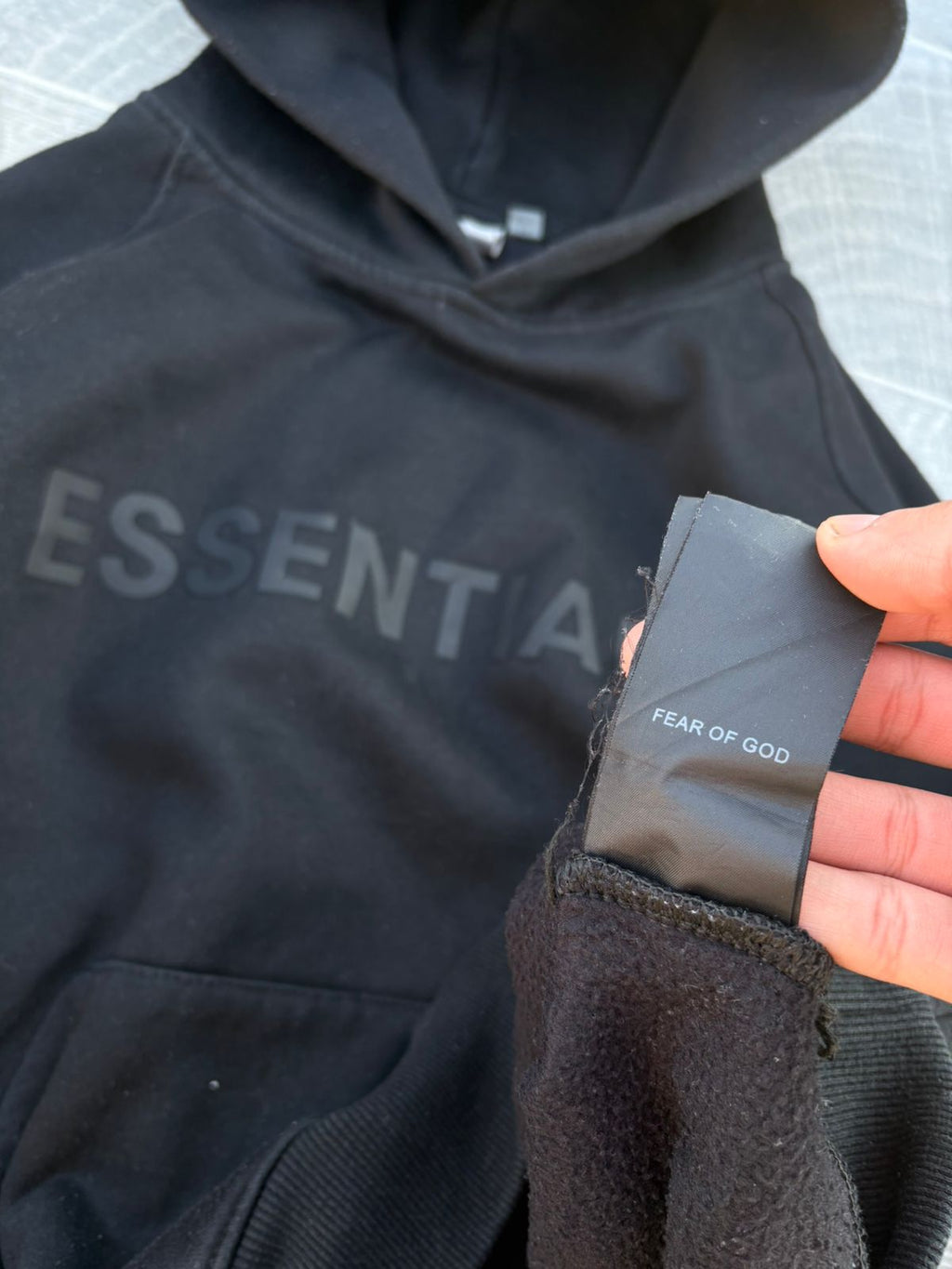 Black Fear of God Essentials hoodie