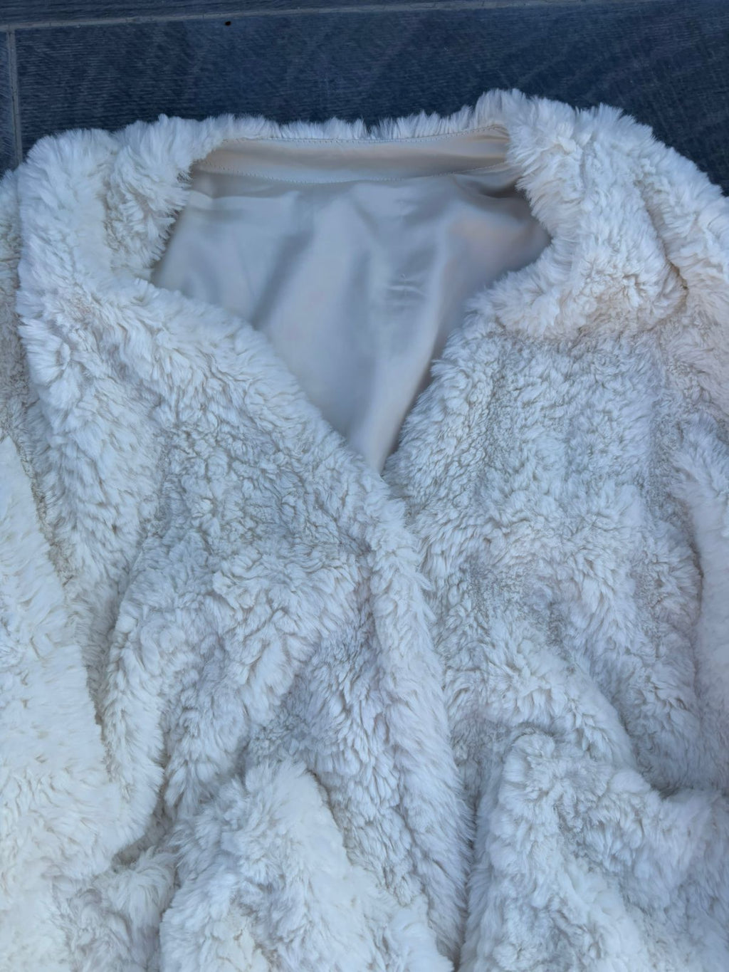 Heavy white faux-fur or "teddy" cropped jacket