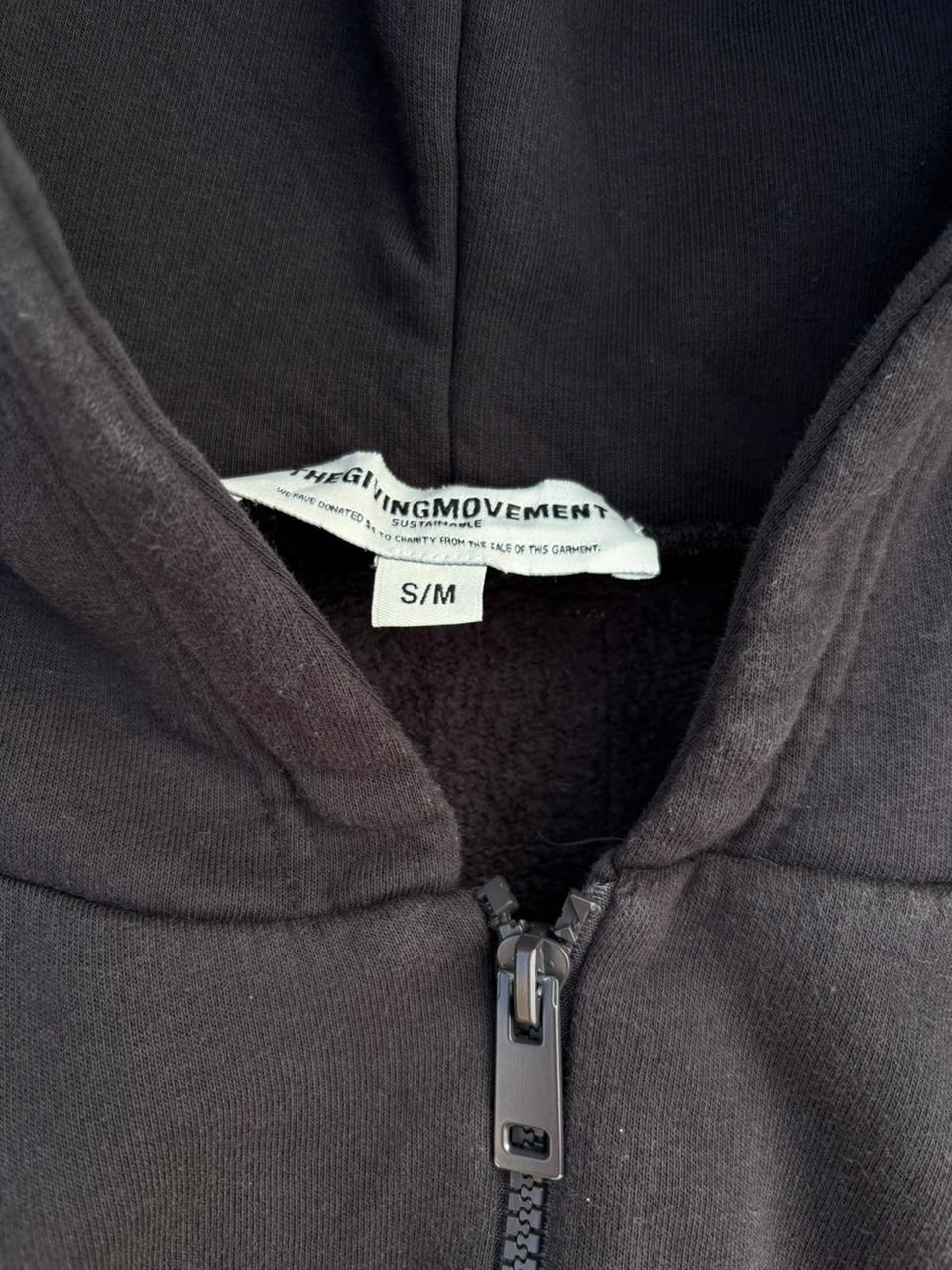 the giving movment black zip up jacket