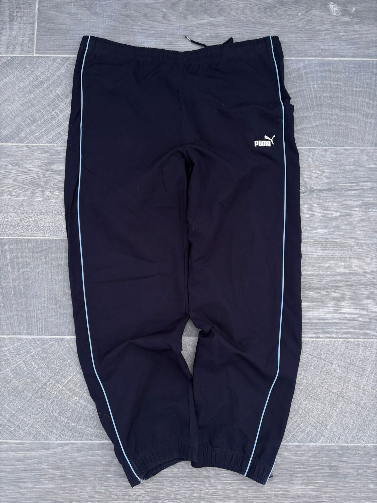 Navy puma and sky blue pants