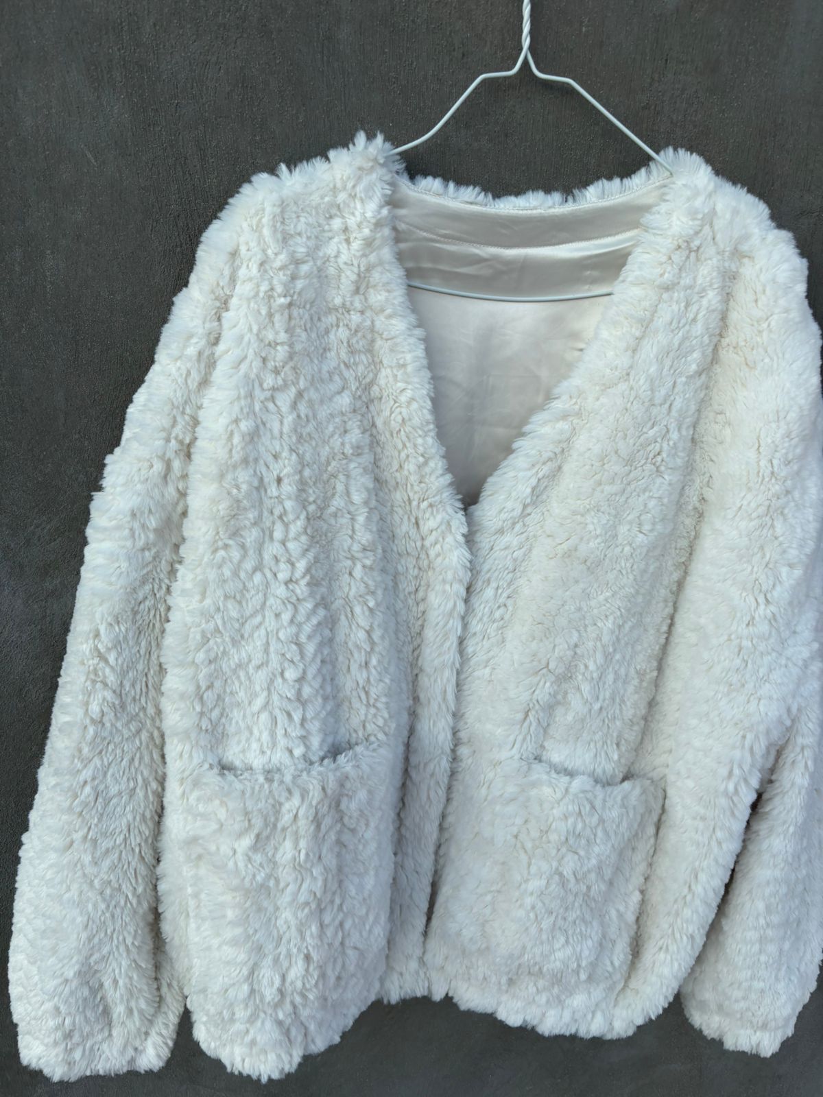 Heavy white faux-fur or "teddy" cropped jacket